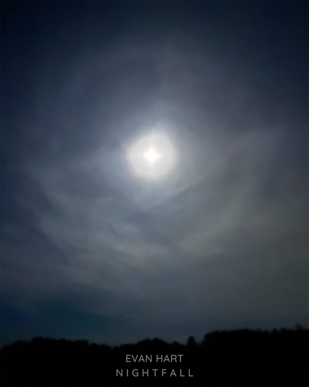 A graphic for the song "Nightfall". It's of the night sky with a star in the middle.